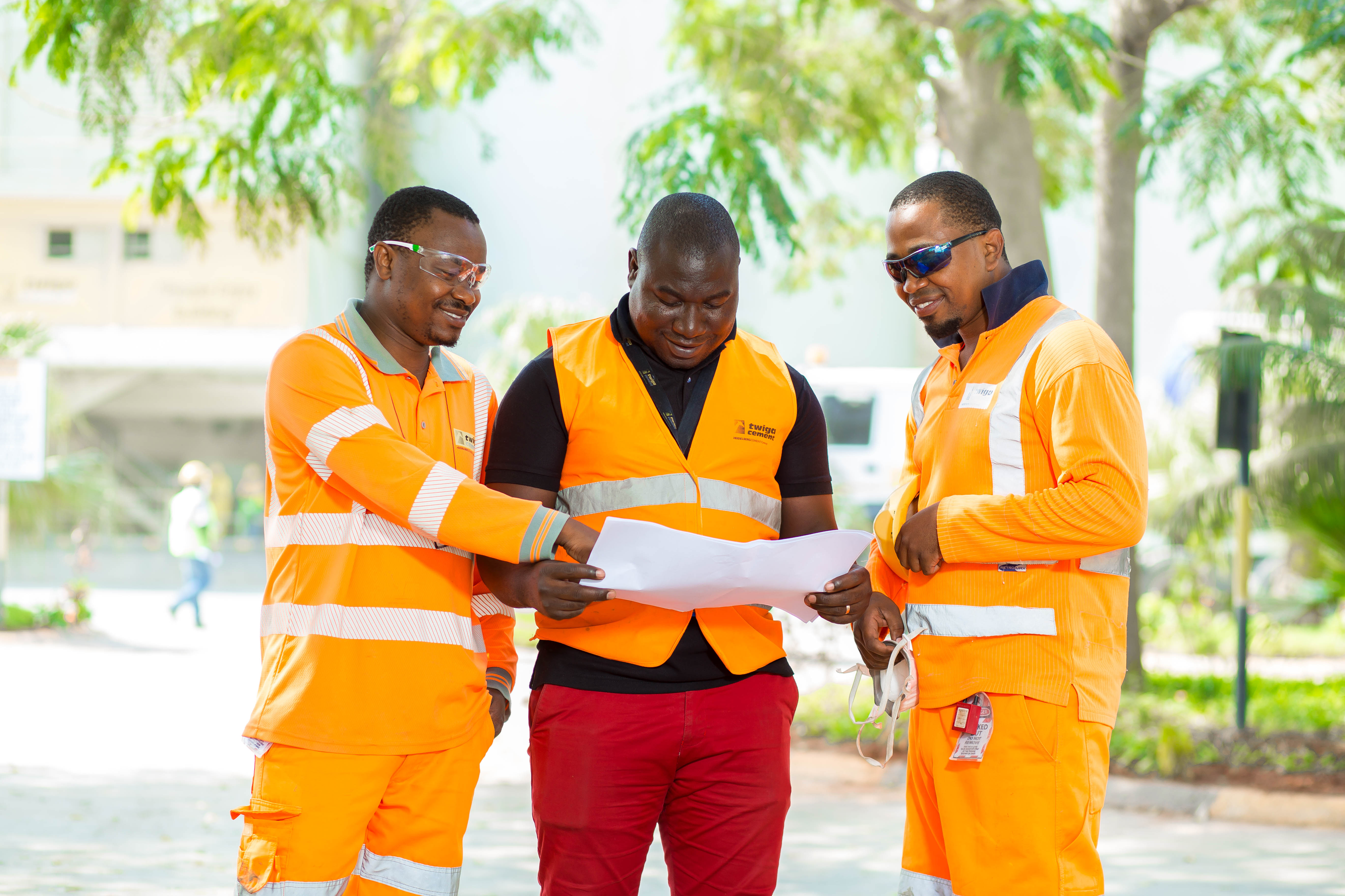 Three employees discussing